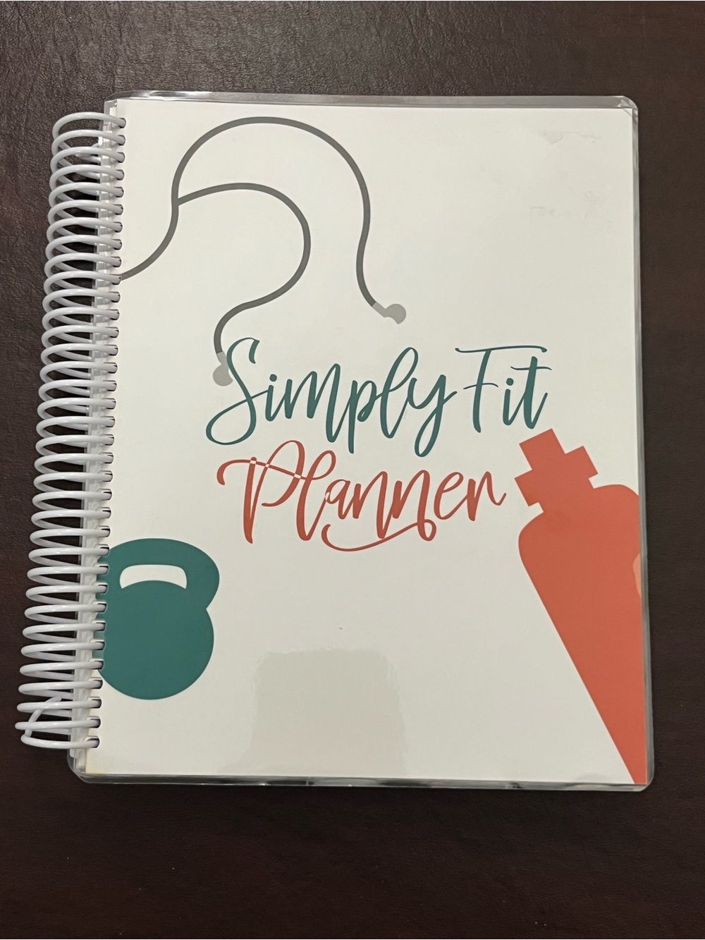 Simply Fit Planner. Track meals, water intake, goals, grocery list.